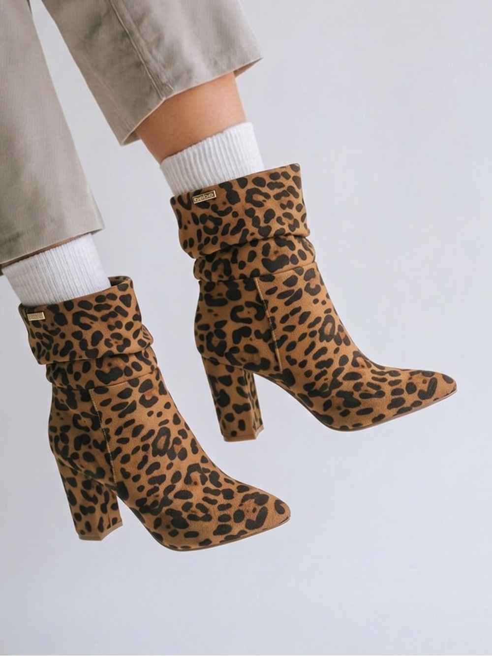 BEBE Women's Savita Leopard print
Slouch Booties